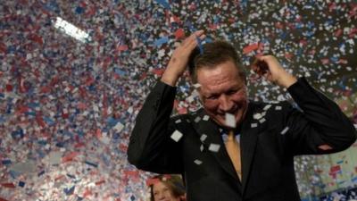 Republican U.S. presidential candidate John Kasich in confetti storm