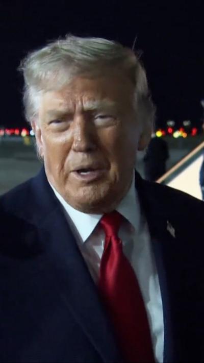 President Trump speaks to reporters at JFK International Airport, New York