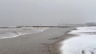 Snow fall at beach in Houston, Texas.