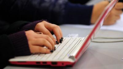 woman using computer