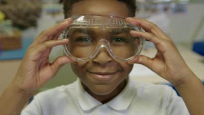 Child wearing safety goggles