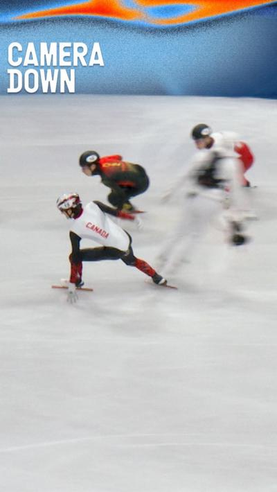 Speed skater collides with camera operator