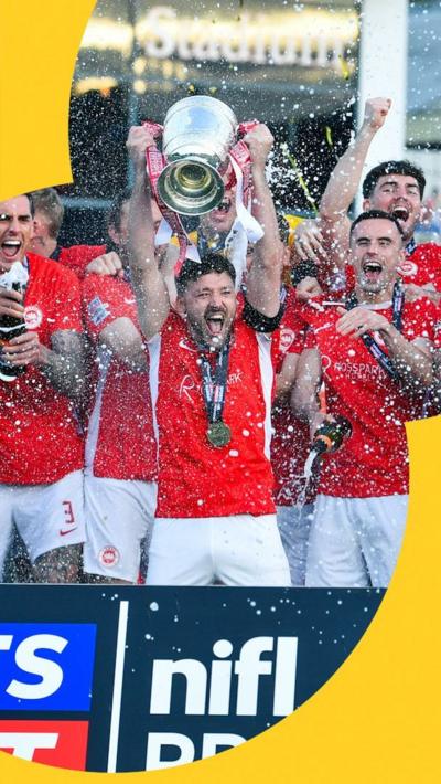 Larne captain Tomas Cosgrove lifting the Gibson Cup in April