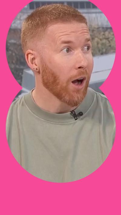 A man with cropped ginger hair, beard and moustache looks to his left with a surprised expression on his face. He is wearing a stone-coloured T-shirt.