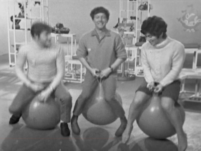 John Noakes and Valerie Singleton bouncing on spacehoppers