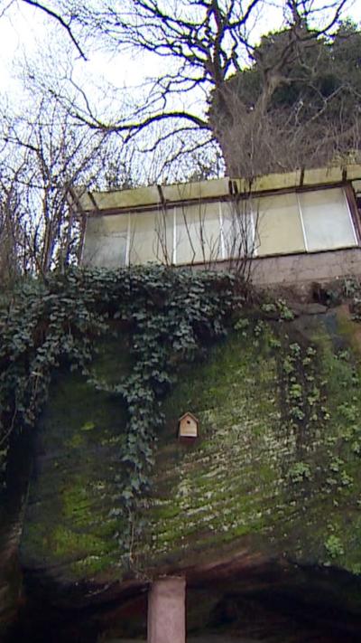 Part of a home set in a sandstone rock