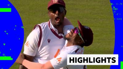 Jason Holder celebrates taking a catch