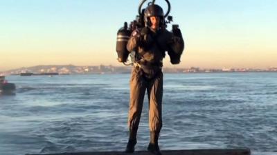 A man flying a jet pack