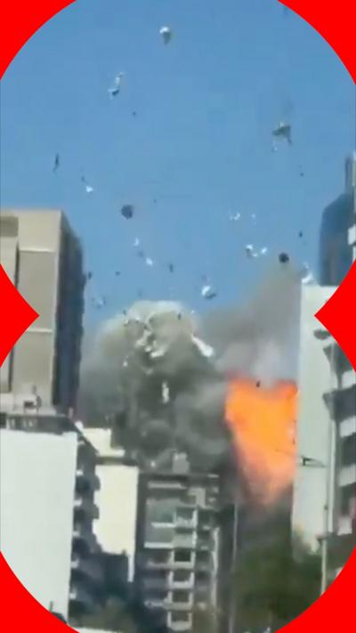 Flash of fire from an explosion on a tower block