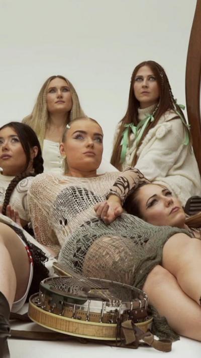 Girl band posing for photo