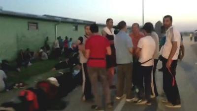 Still from timelapse of migrants in a long queue waiting for transport at the Croatian border town of Tovarnik