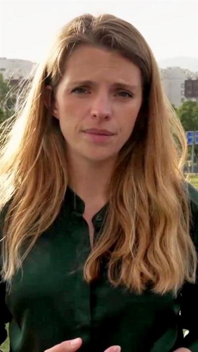 Carrie Davies standing in front of the Serena Hotel in Islamabad.