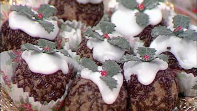 Truffles decorated to look like Christmas puddings.