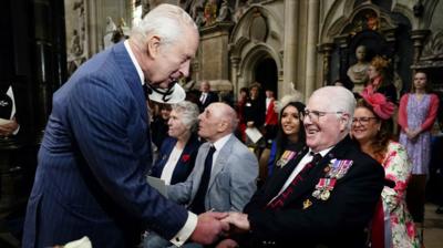 King Charles speaks with Second World War veterans