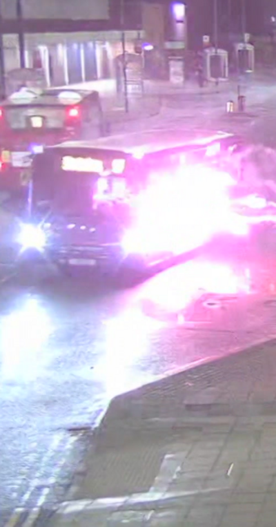 Fireworks fired at bus on a street