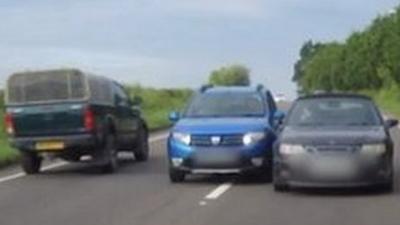 Car overtaking into traffic