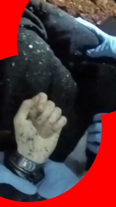 Henry Nowak's hand being cuffed in bodycam footage