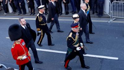 The Queen's children lead a procession behind her coffin