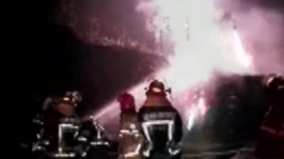 Fireworks explode for nearly five hours after the lorry carrying them overturns in China.