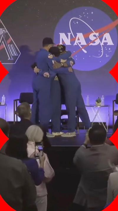 Artemis crew hug
