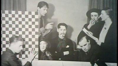 The cast of The Man with a Flower in his Mouth preparing to film.