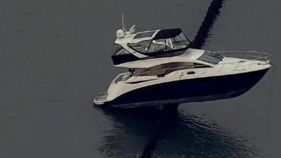 Yacht stuck on top of a breakwall near San Francisco Bay, California