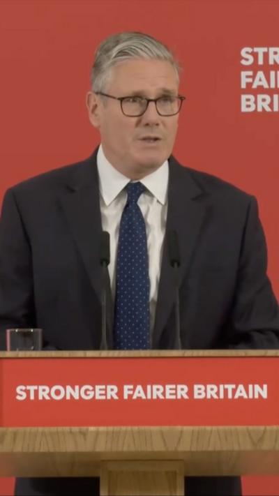 Sir Keir Starmer I front of a podium