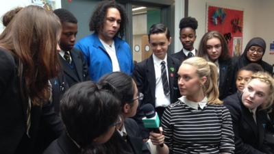 School kids discuss the issue of racism with anti-bullying campaigner Alex Holmes