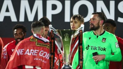 Wrexham players with trophy