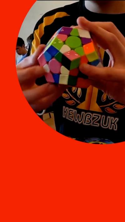 Boy holding a megaminx