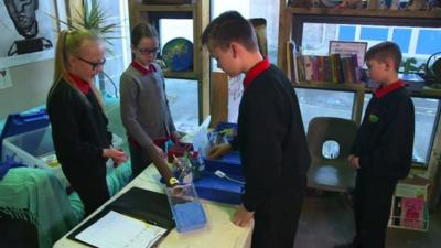 Pupils at a school art shop