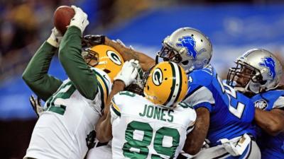 Tight end Richard Rodgers of the Green Bay Packers catches the game-winning touchdown at Detroit