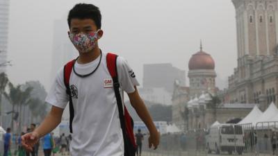 Boy in smog