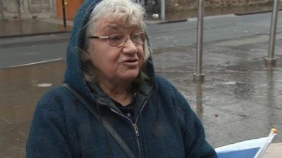 Woman outside the Scottish Parliament