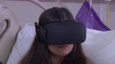 Woman wearing a VR headset