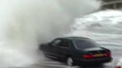 Car hit by waves
