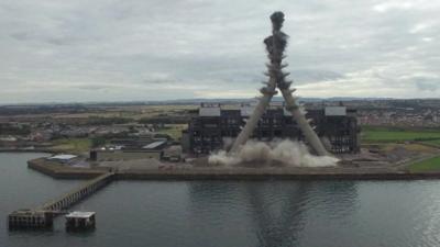 Chimneys being demolished