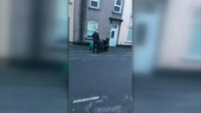 Police arresting a man in Newport over the Parsons Green attack