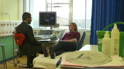 Female patient with doctor