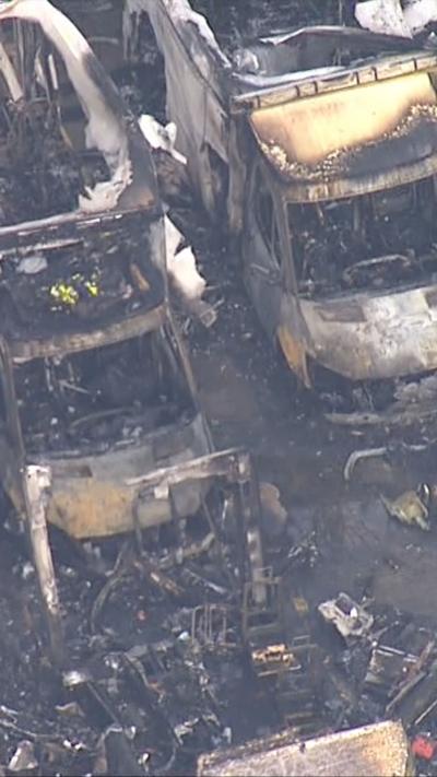 Burnt out ambulances seen from above 