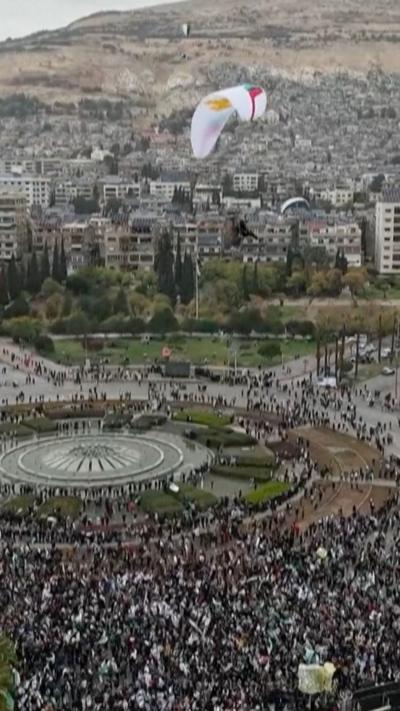 Aerial shot showing people celebrating in Damascus