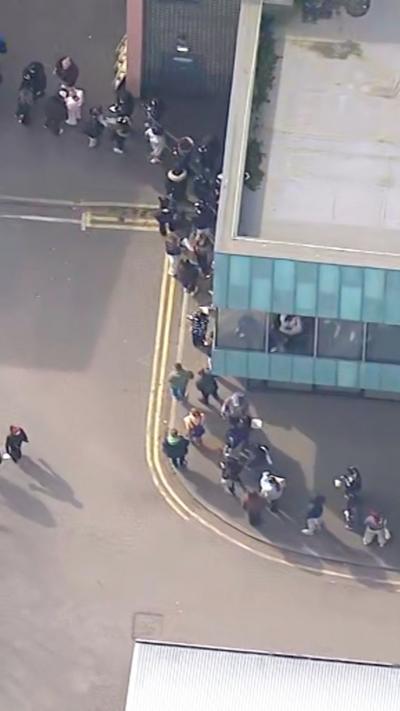 A queue of students in Kent 