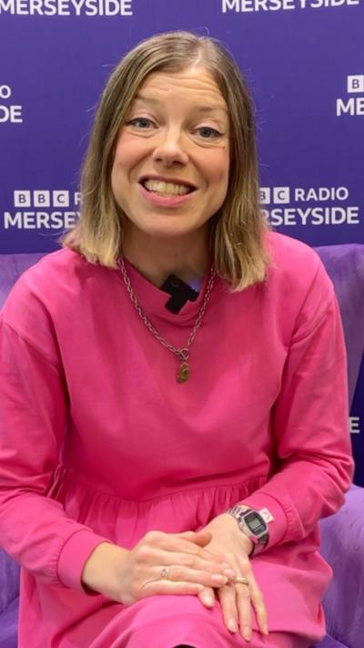 Claire Hamilton seated 