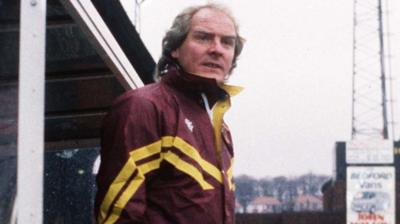Terry Yorath looks on at pitchside