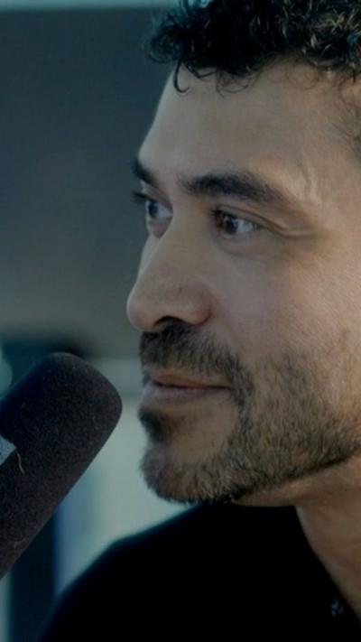 Rav Wilding talks on a microphone
© BBC
