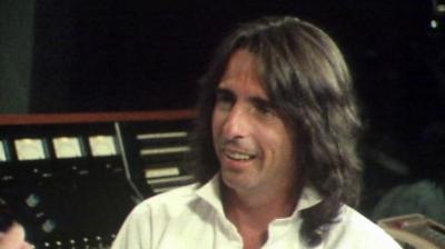 Alice Cooper being interviewed in a studio.