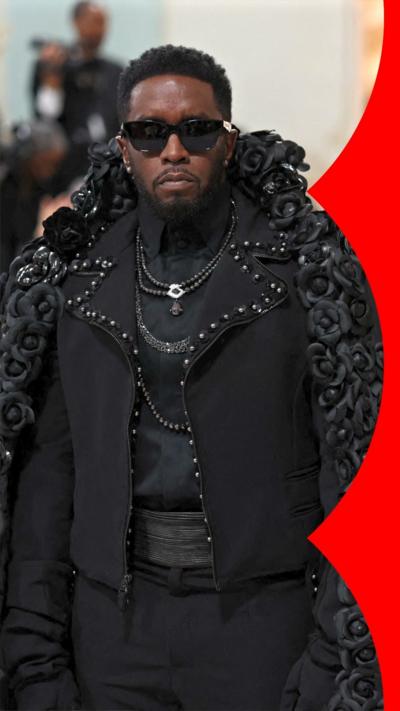 Sean 'Diddy' Combs wearing sunglasses and dressed in black.