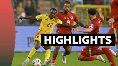 Sorba Thomas and Jeremy Doku battle for the ball 