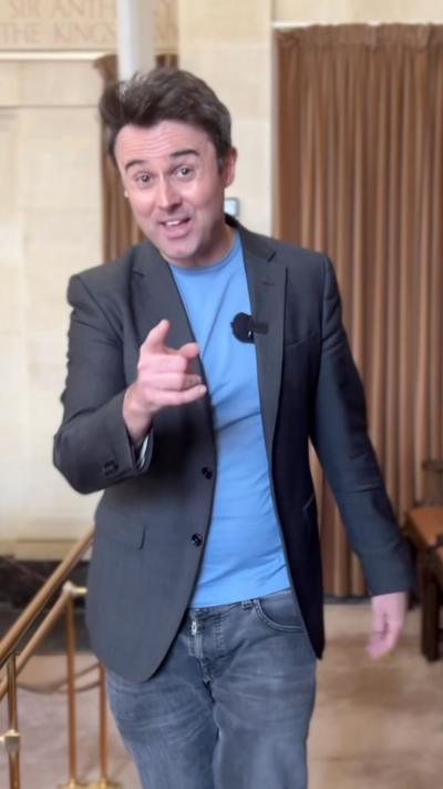 Reporter in local council chamber