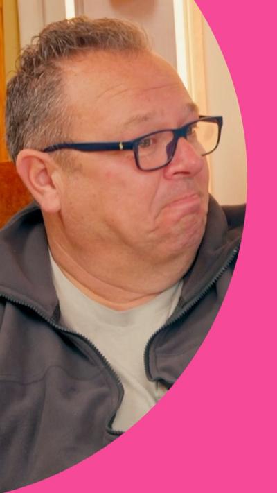 Daren looking to the right, with an emotional expression on his face